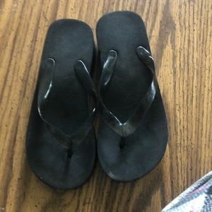 Black low heel black flip flops